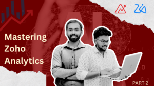 Two professionals working on laptop with Zoho Analytics concept for mastering data insights and reporting